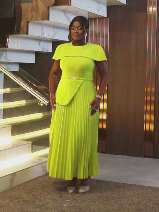 This A-Line career dress features a round collar, cape sleeves, and an asymmetric pleated design
